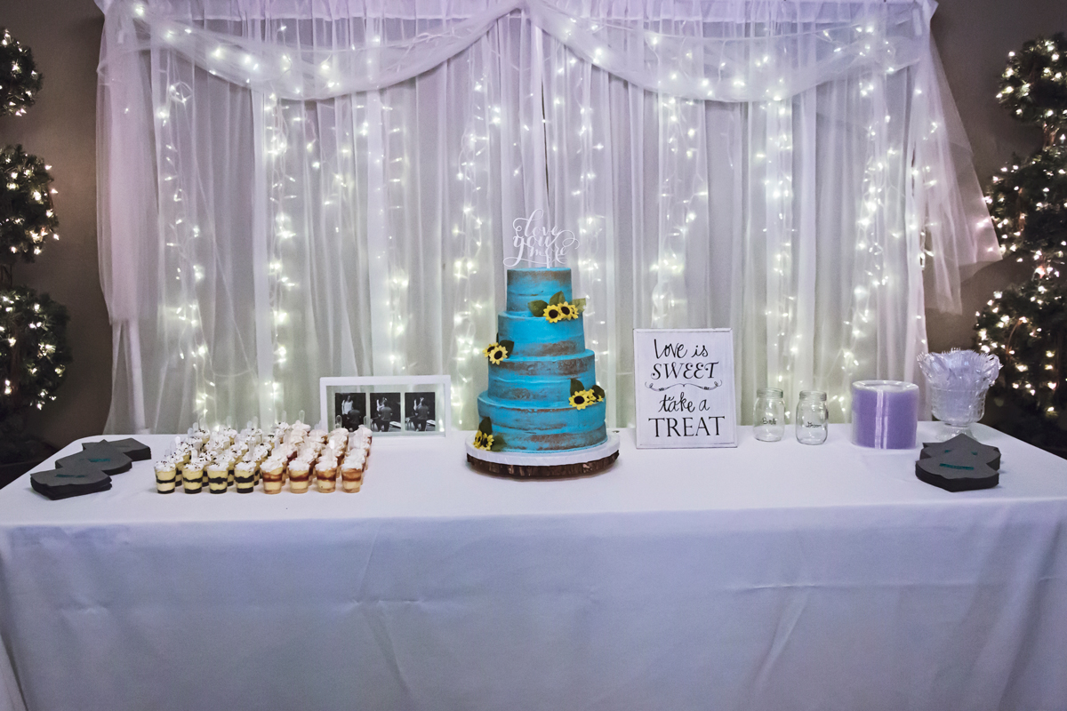 A Table With a Cake and Dessert Cups | Wedding Packages